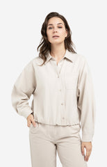 Blouse with asymmetric button placket and elastic hem