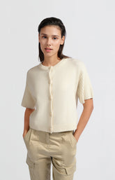 Cream-colored cardigan with short wide sleeves and round nec