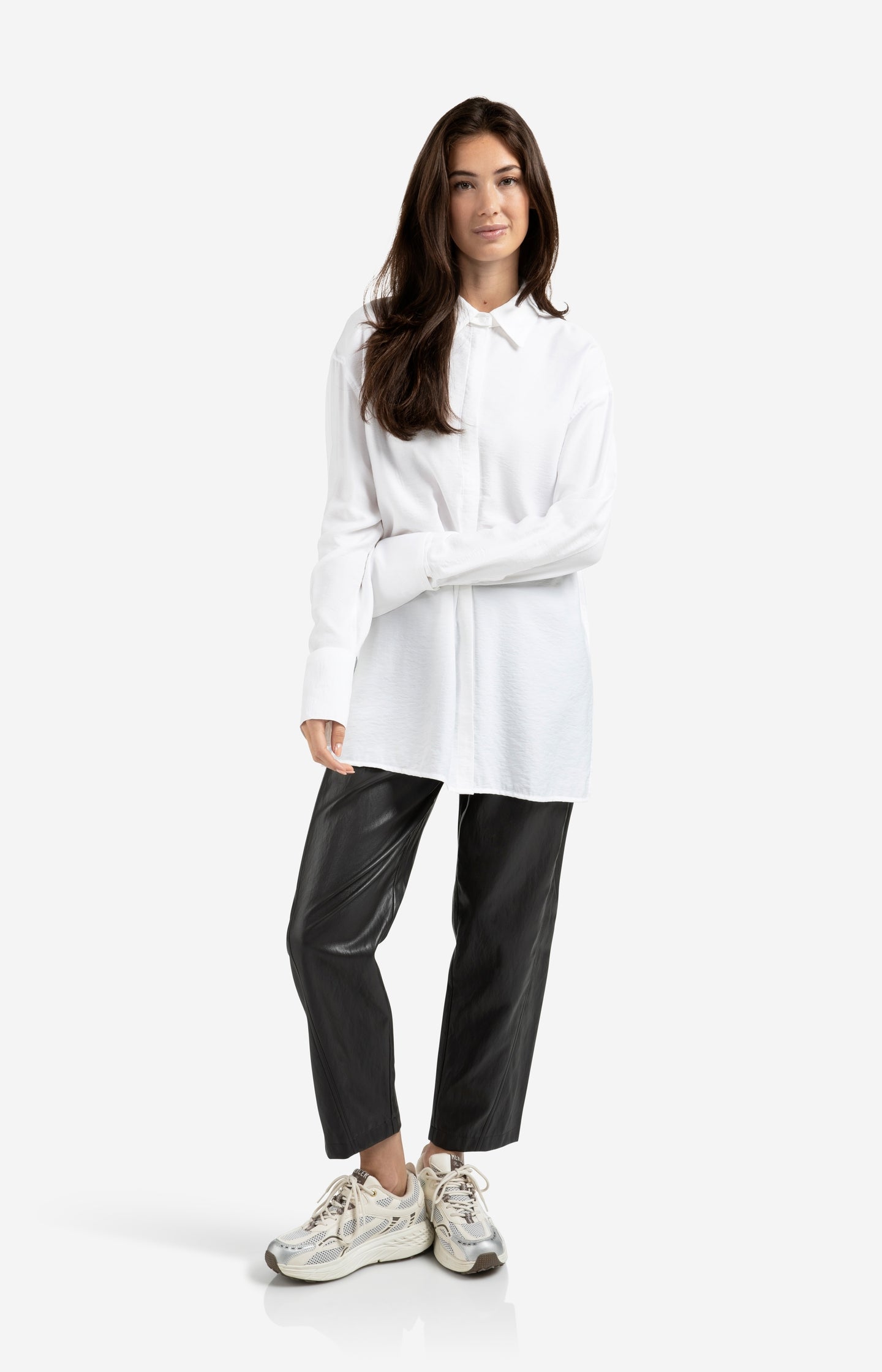 Faux leather trousers with seam details