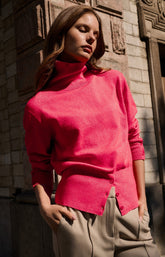 Knitted high neck sweater with button details