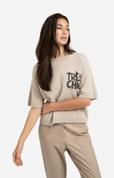 Knitted short sleeve sweater with artwork