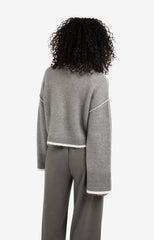 Knitted sweater with contrasting lines