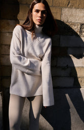 Knitted sweater with high neck and wide rib trims