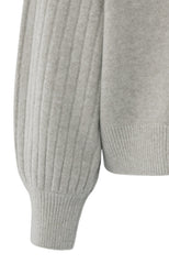 Knitted sweater with ribbed sleeves and round neck