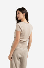 Knitted top with double hem and button details