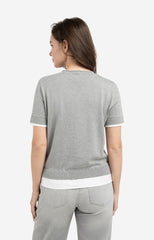 Knitted top with short sleeves and double blouse hem