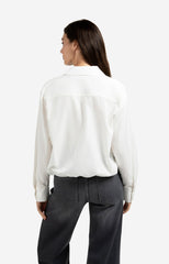 Layered blouse with tie detail and long sleeves