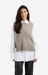 Ribbed sleeveless sweater with side buckles