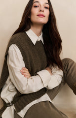 Ribbed sleeveless sweater with side buckles