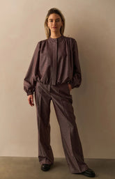 Shiny woven trousers with wide legs and front pleat