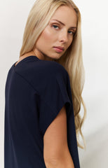 Sleeveless dress with double V-neck and front slit