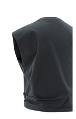 Sleeveless top with shoulder pads and pleat detail