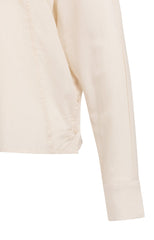 Blouse with angled seams and button details