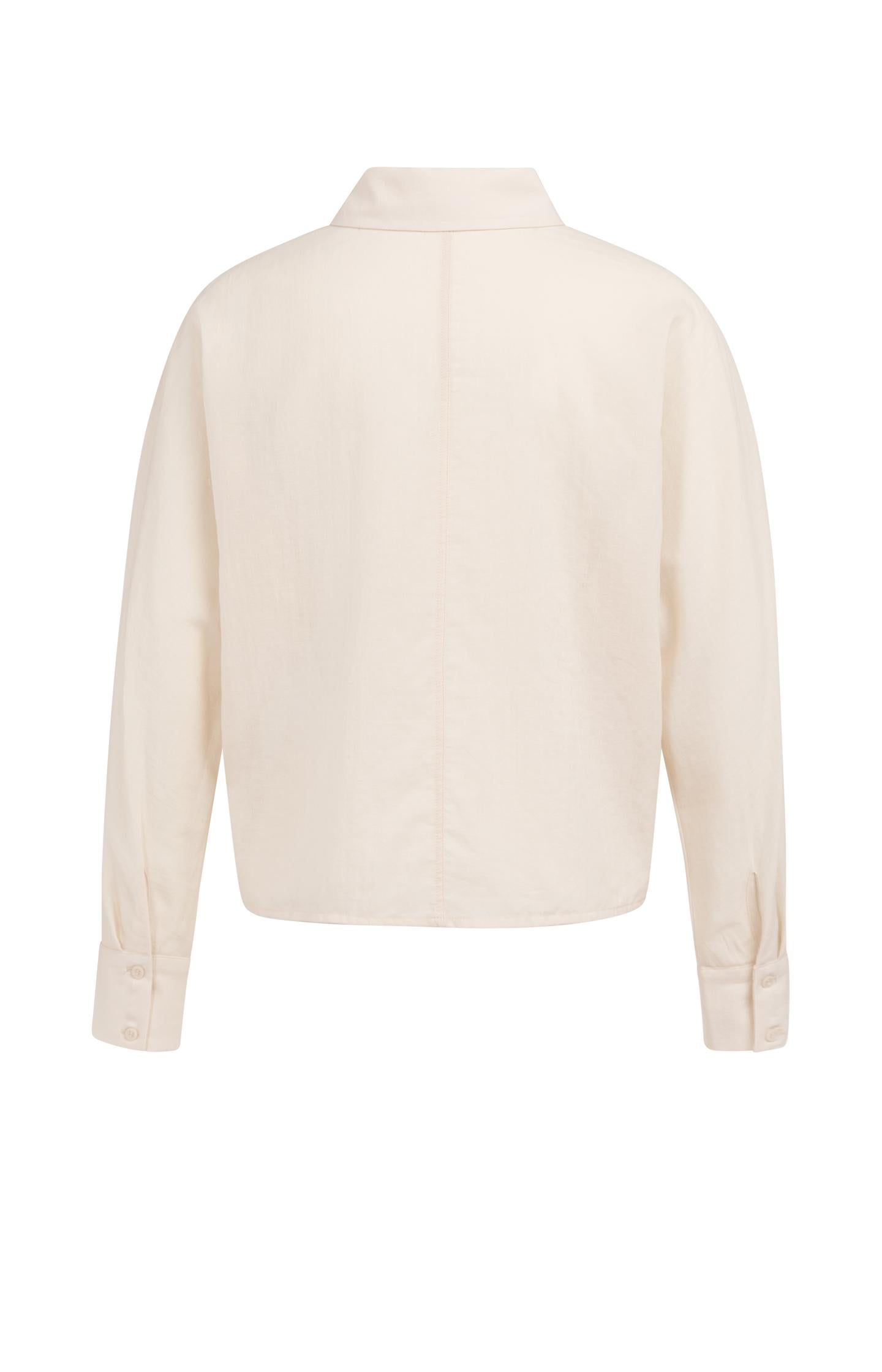 Blouse with angled seams and button details