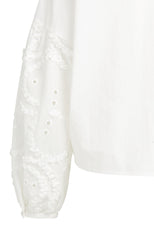 Blouse with embroidered sleeves and round neckline