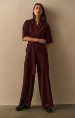 Jersey jumpsuit with short sleeves and tie belt