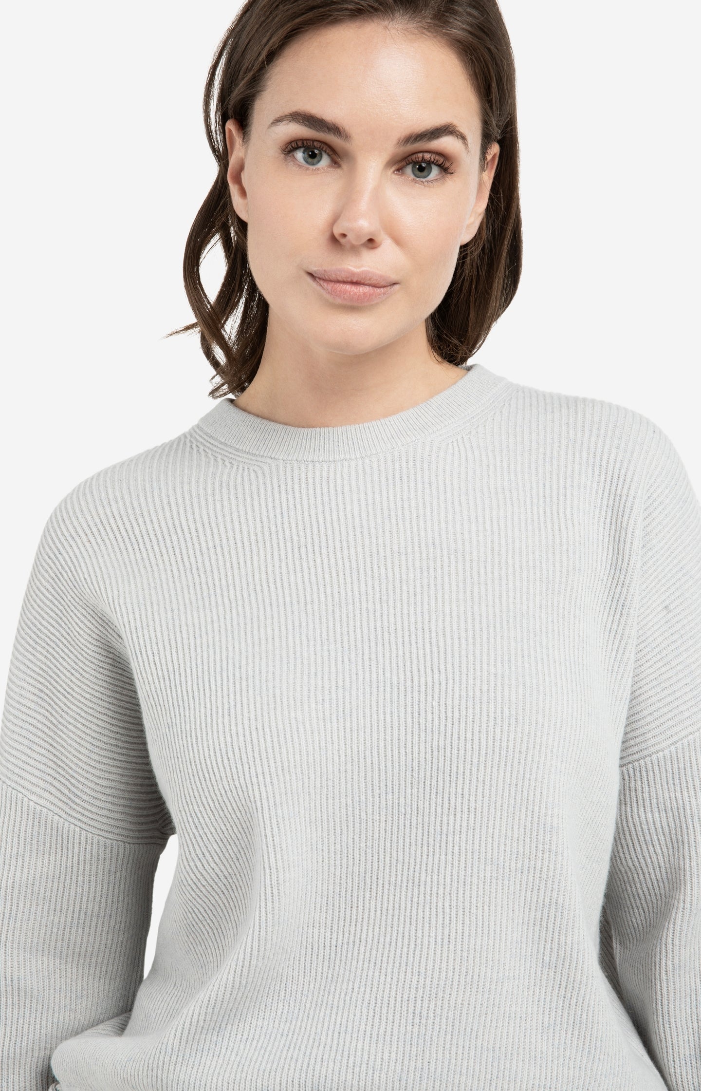 Knitted sweater with tie details at the hem