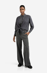 Layered blouse with tie detail and long sleeves