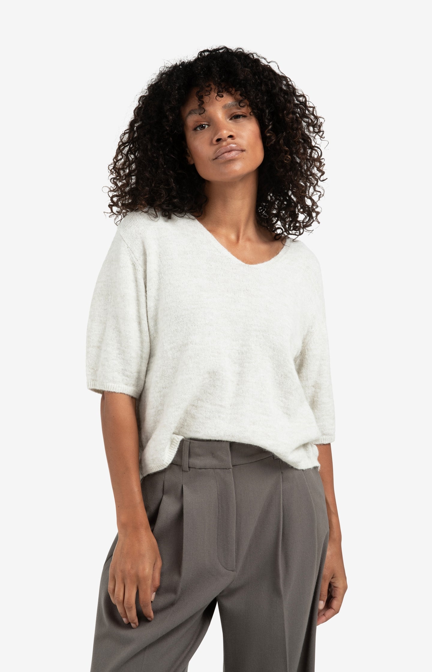 Melange knit with V-neck and button details