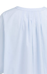 Oversized batwing blouse with pleats and wide sleeves