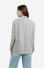 Oversized blazer with fancy button details