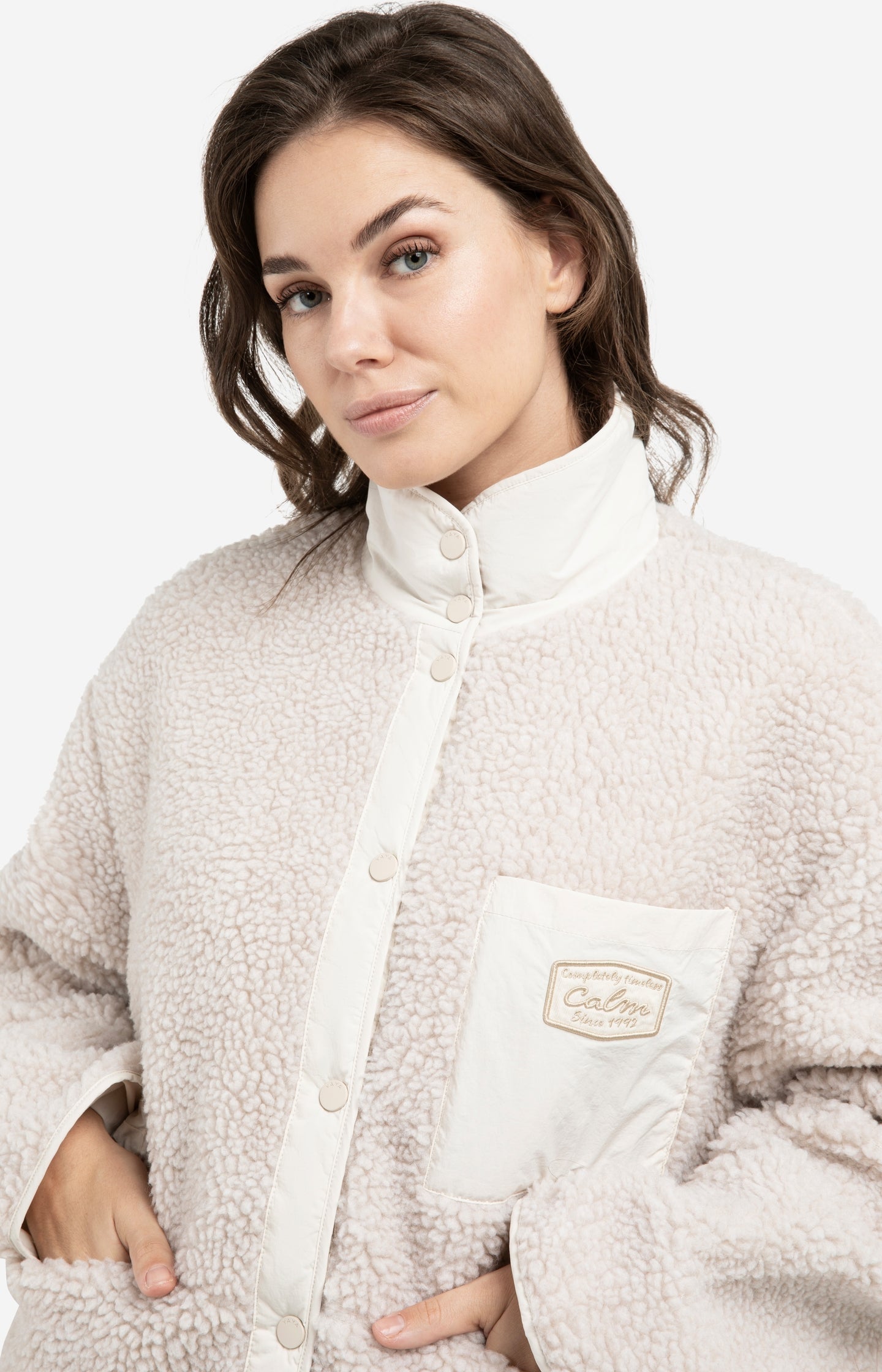 Reversible teddy jacket with nylon chest pocket