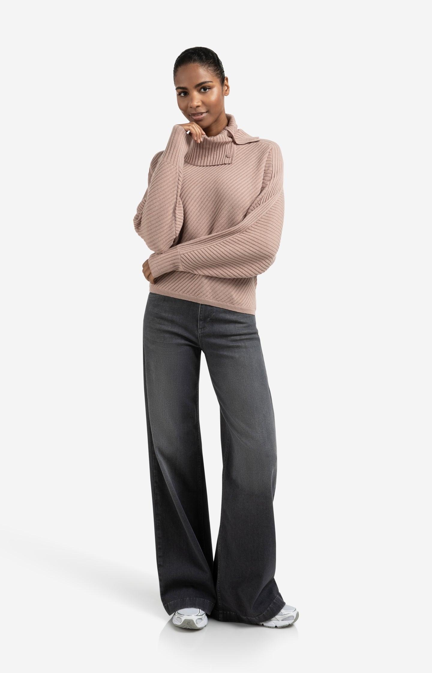 Ribbed sweater with batwing sleeves and high collar