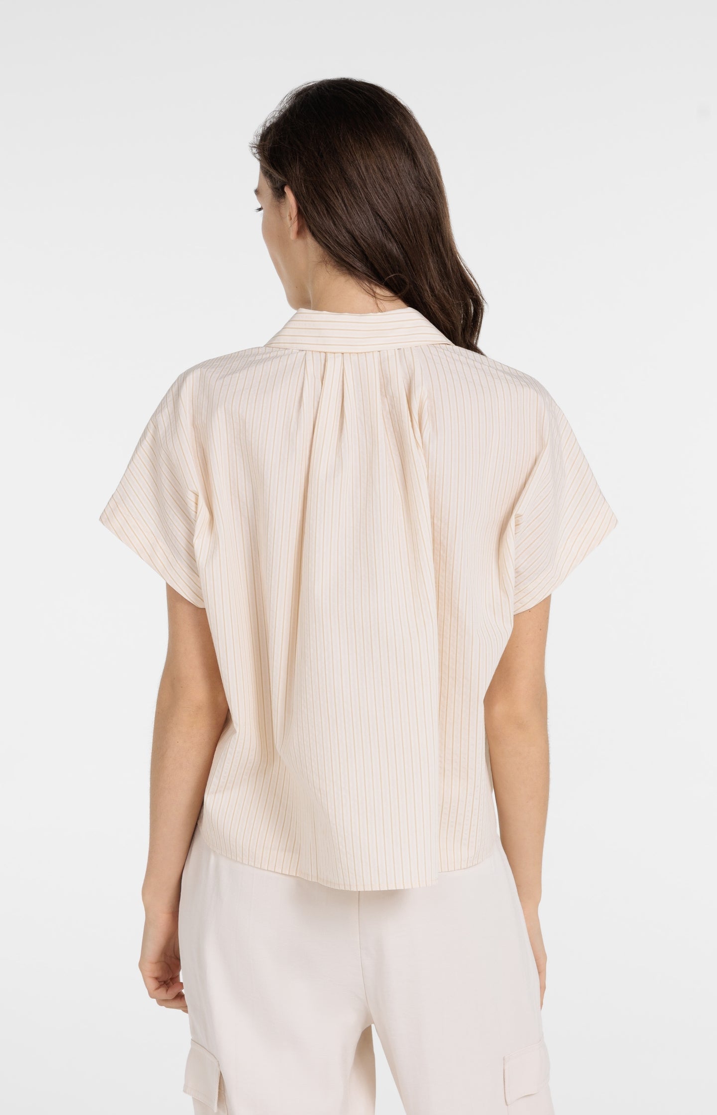 Sleeveless striped blouse with button detail