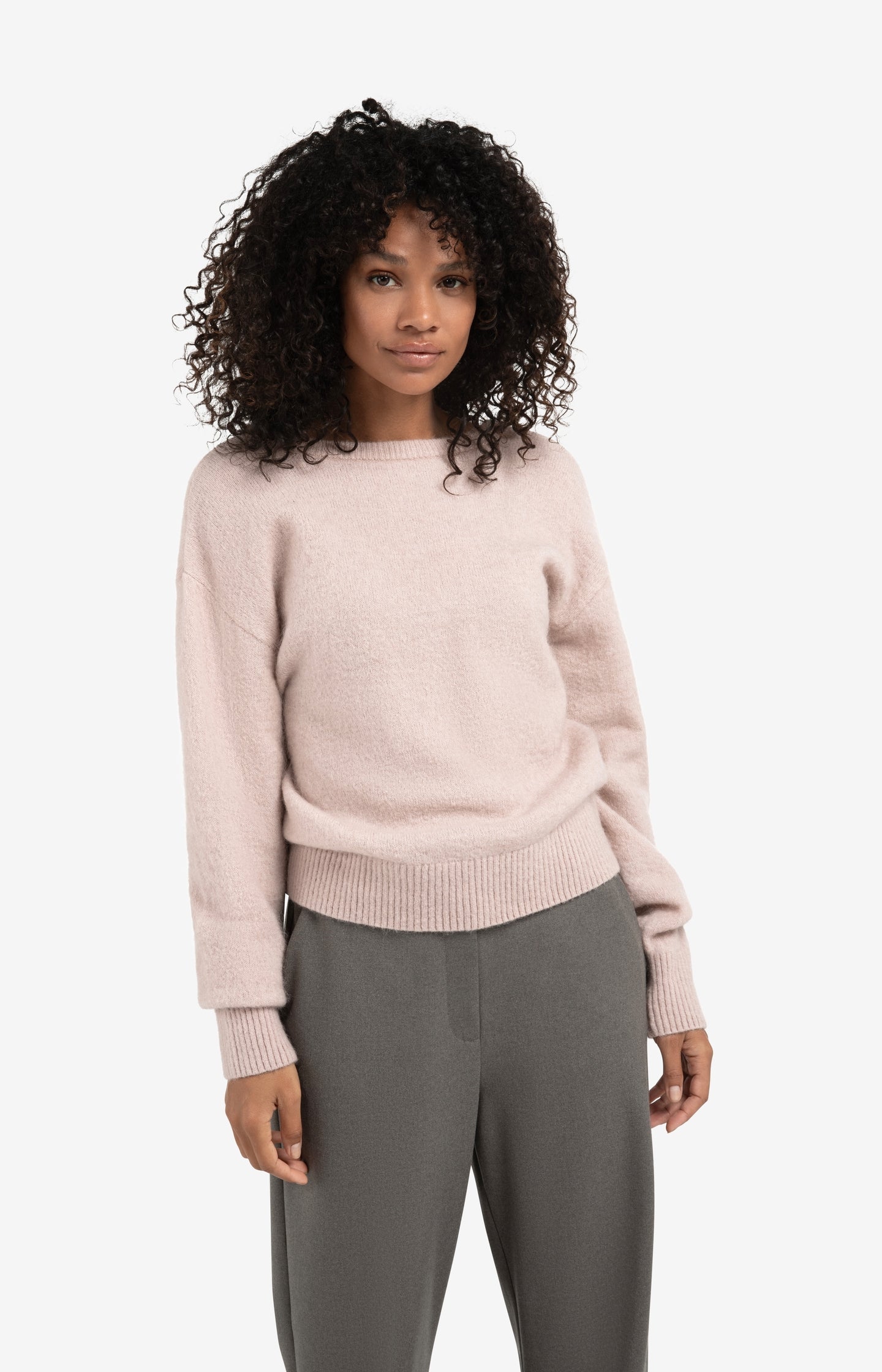 Soft sweater with V-back and tie detail