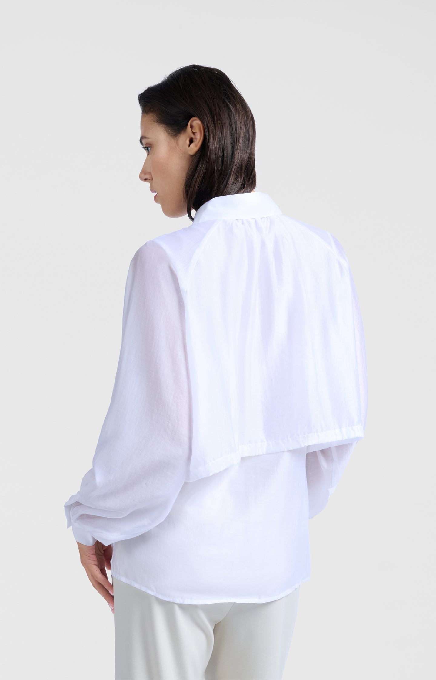 Subtle shiny blouse with double layer and sballoon sleeves