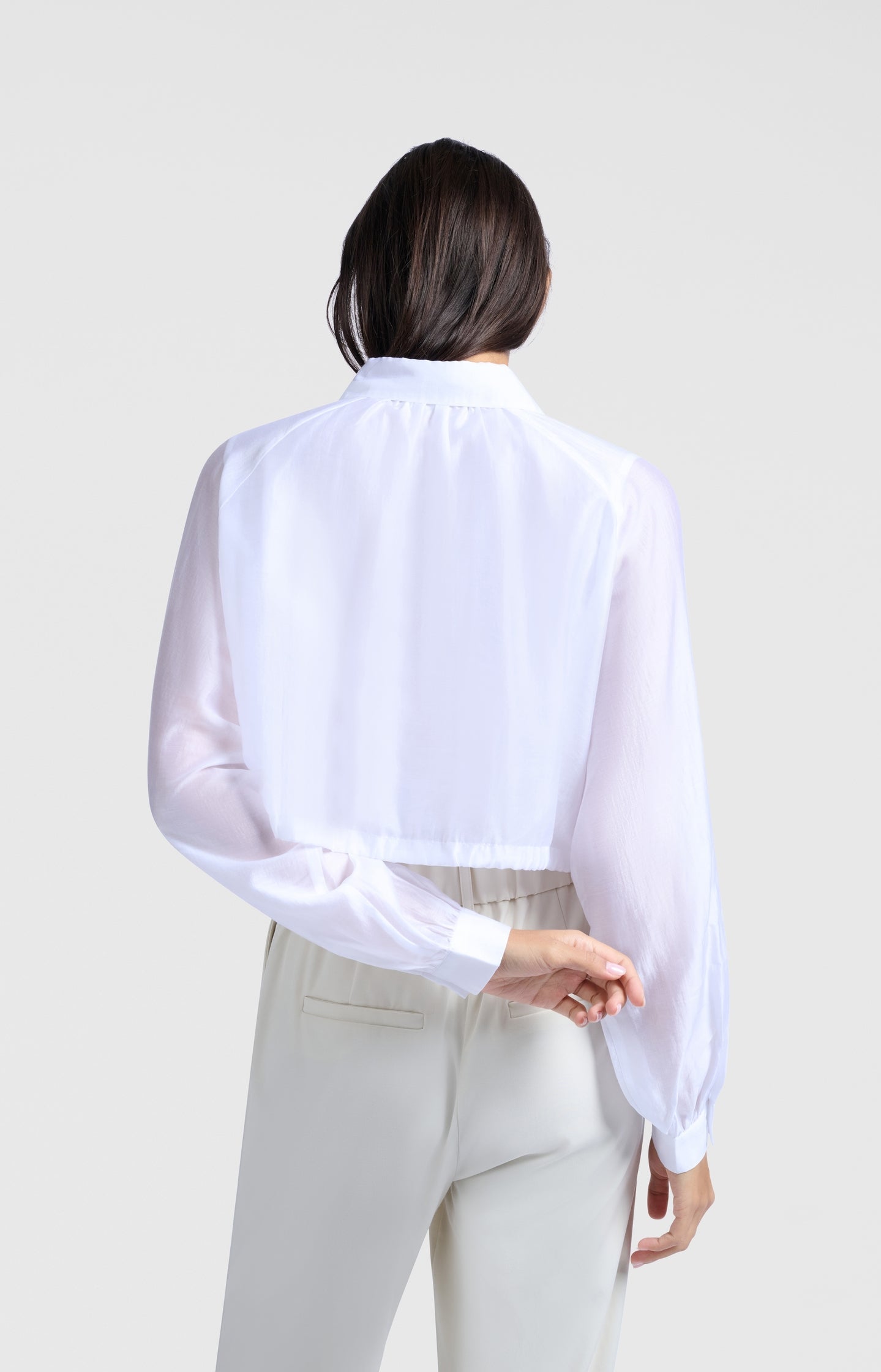 Subtle shiny blouse with double layer and sballoon sleeves
