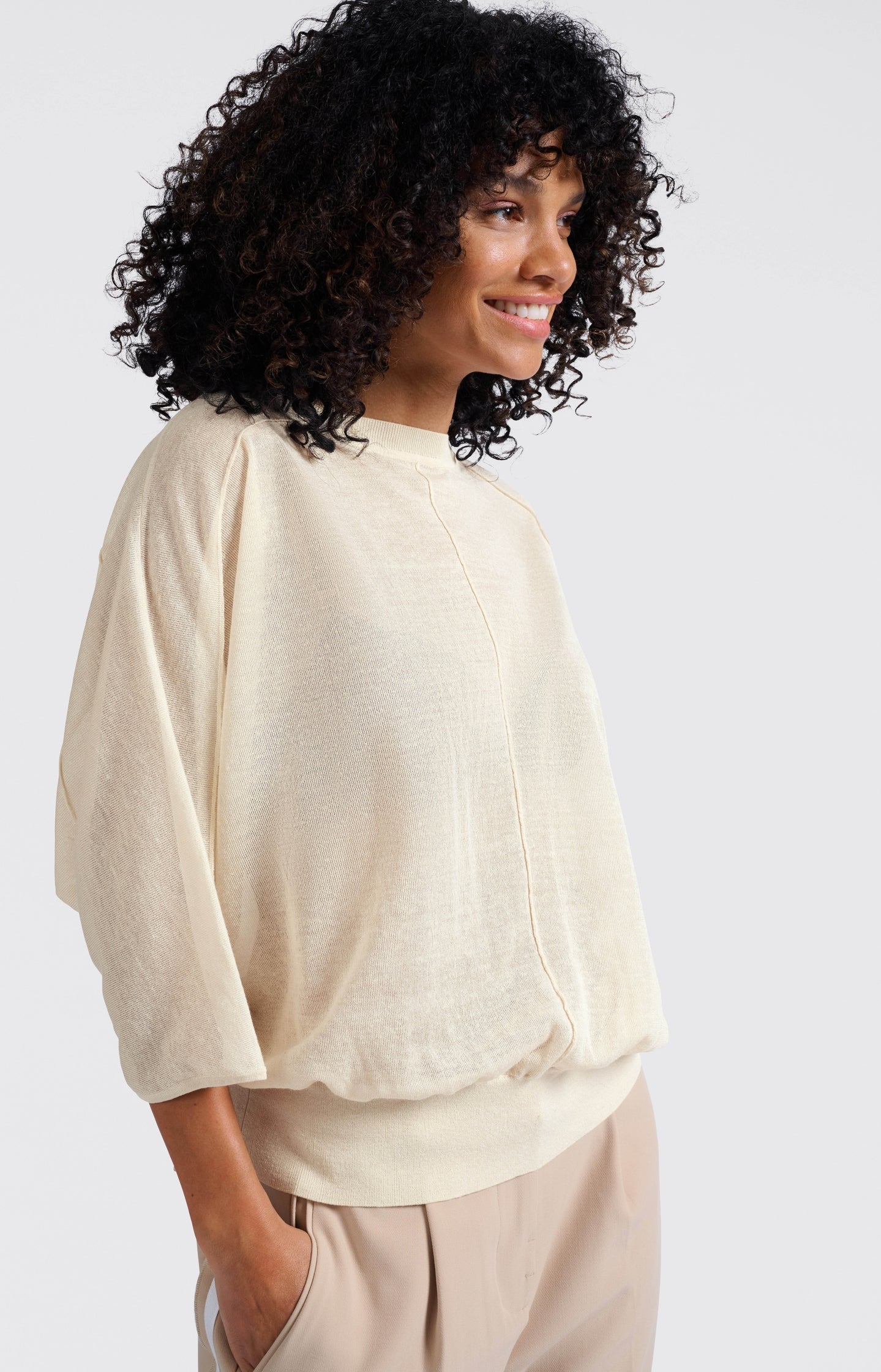 Transparent sweater with batwing sleeves
